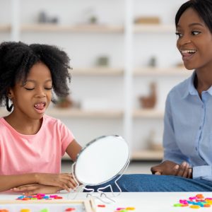 Kid with stuttering problem visiting speech-language therapist